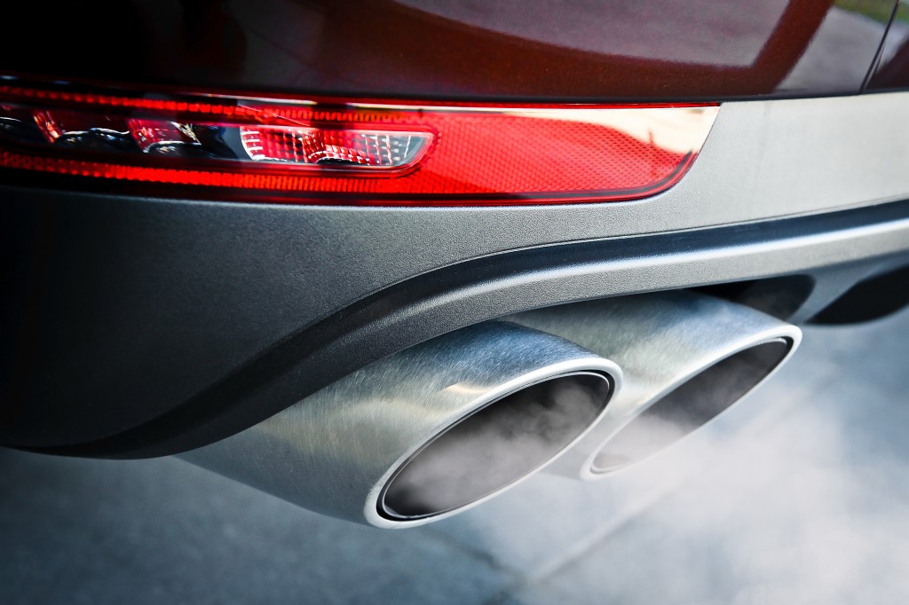 Close up of a car dual exhaust pipe