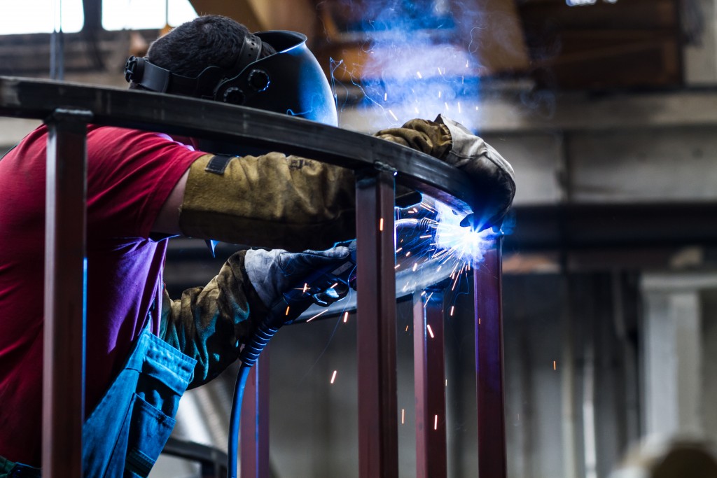 Man welding a metal