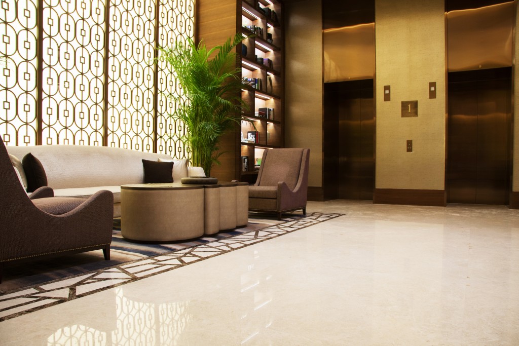 white and brown couches in the hotel lobby