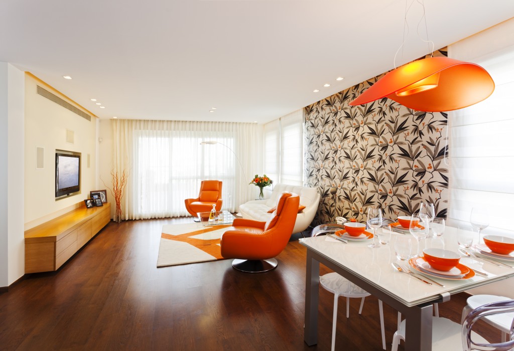 Modern living room with orange touch