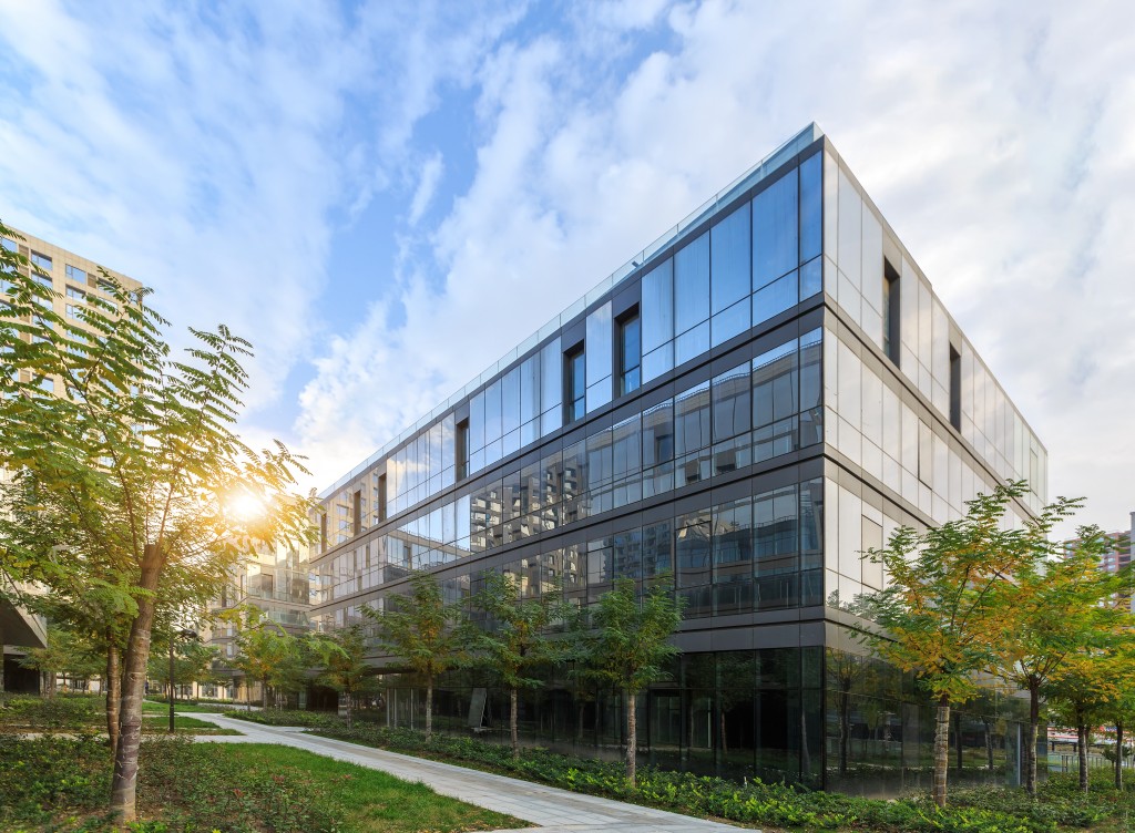 commercial building architecture surrounded by trees