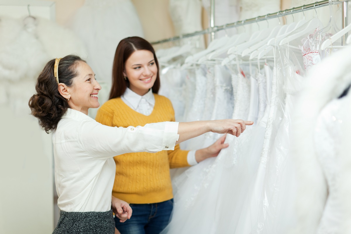 bride to be choosing a wedding gown