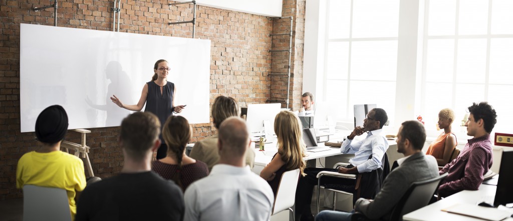 woman presenting in a meeting