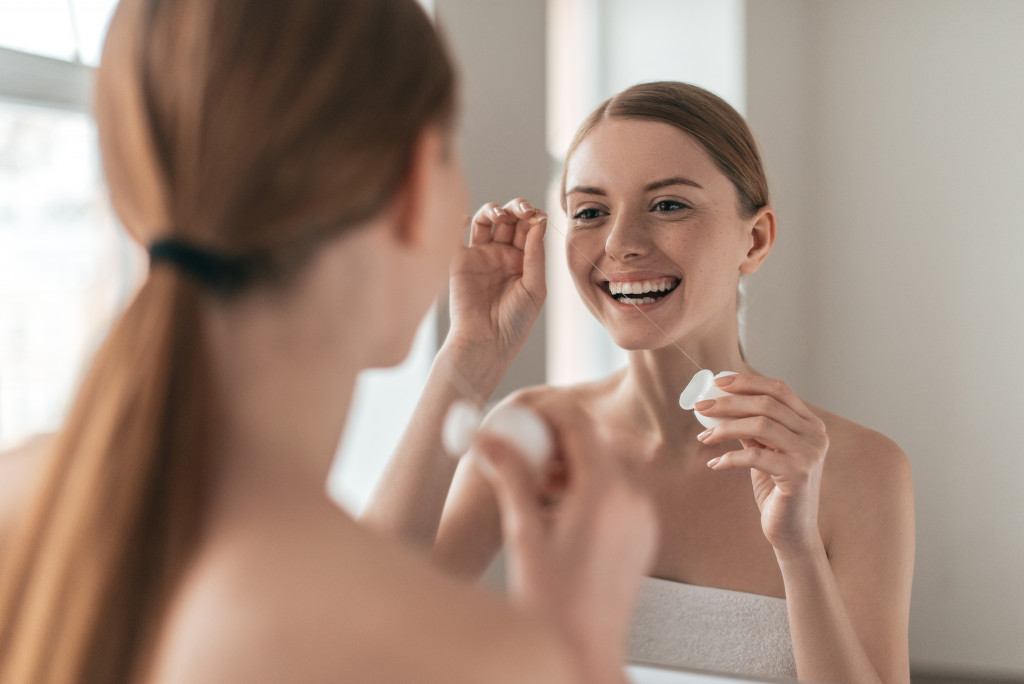 woman placing makeup