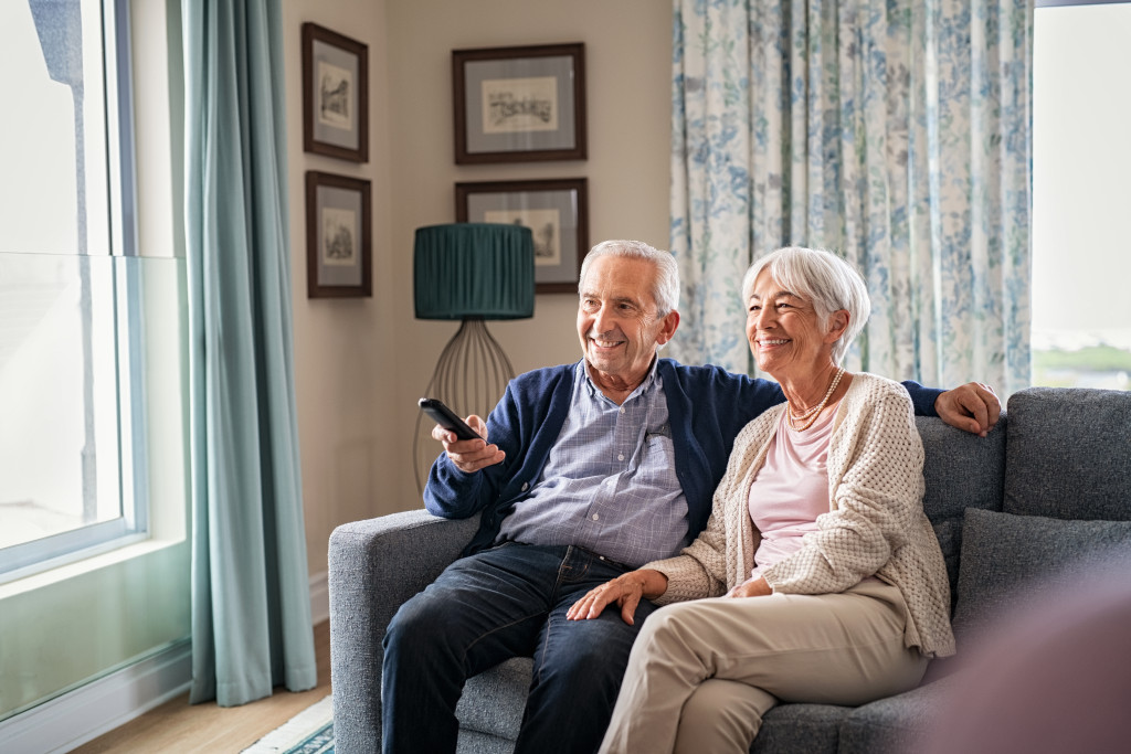 A senior couple in their living room